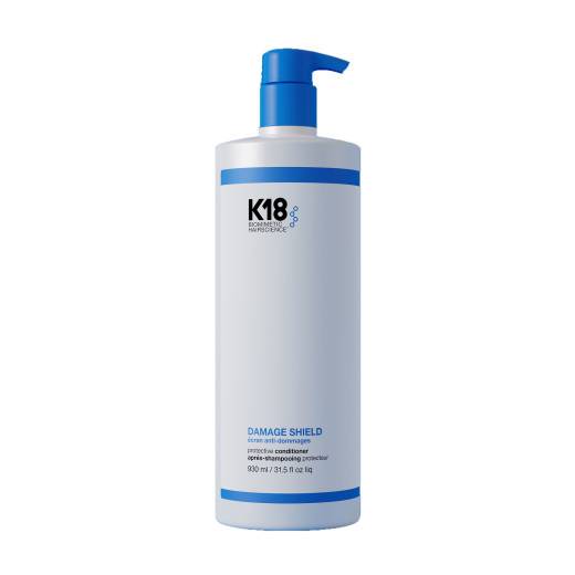 Après-shampoing damage shield de la marque K18 Biomimetic HairScience Gamme Damage Shield Contenance 930ml